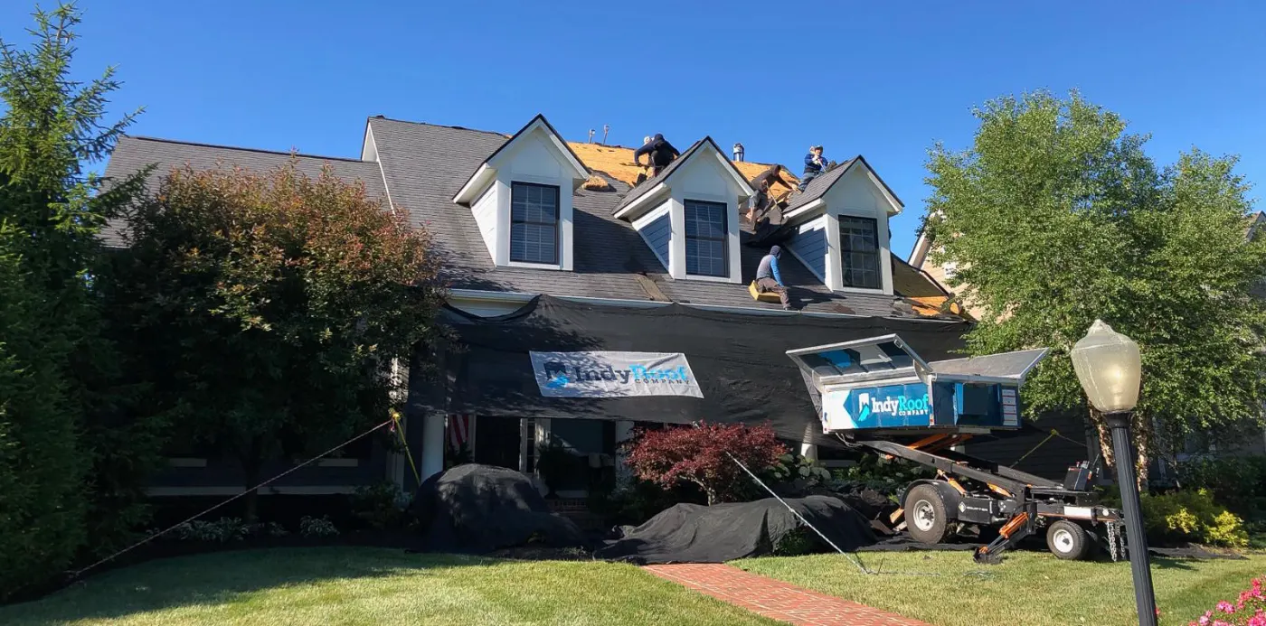 Tarping and dry-in on a Lapel commercial roof